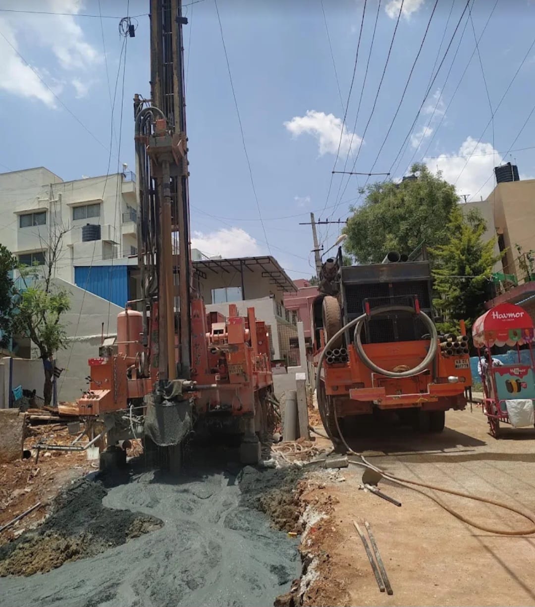 SRS Borewells drilling machine operating in Bengaluru residential street